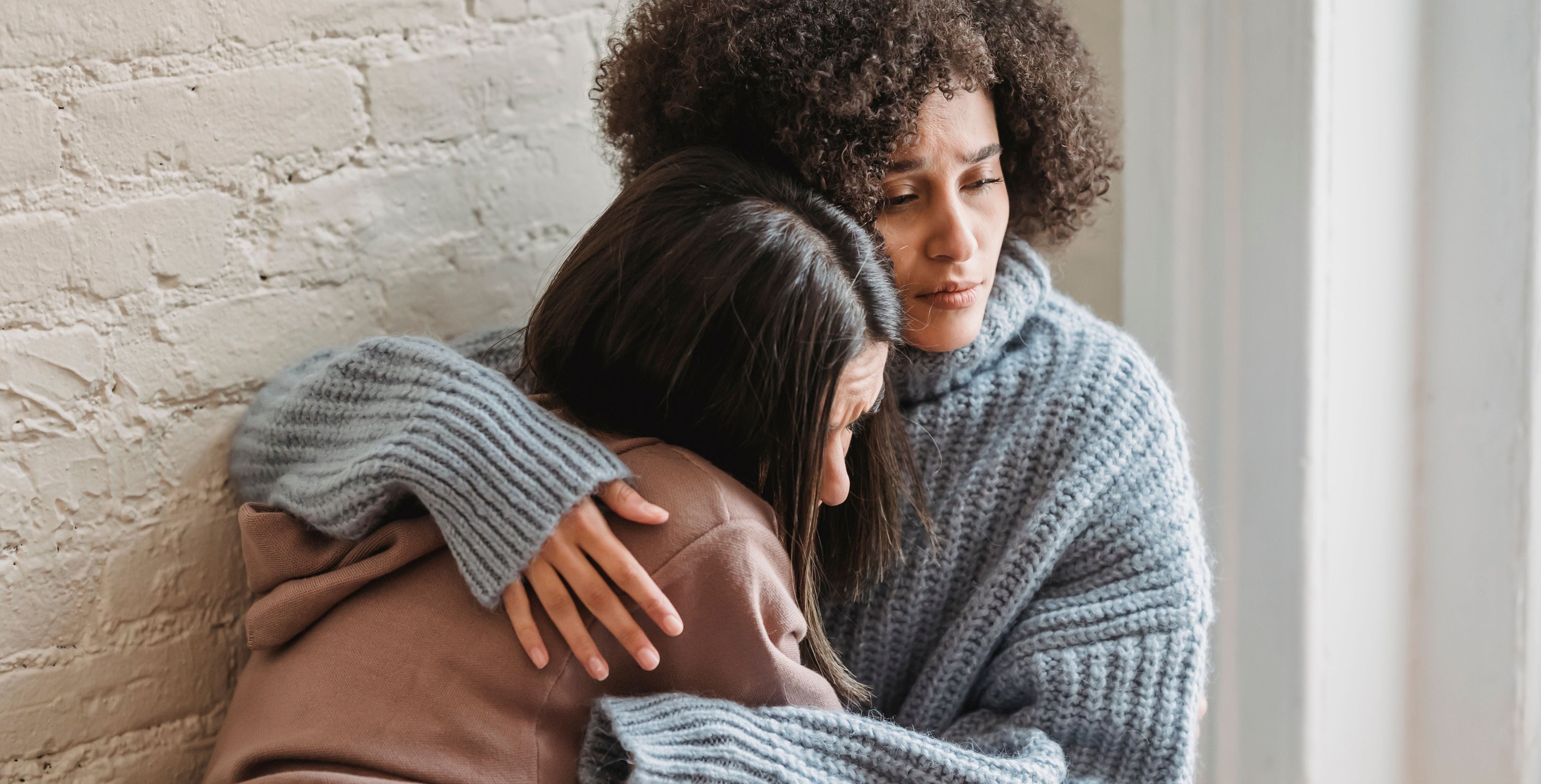 friend comforting another friend